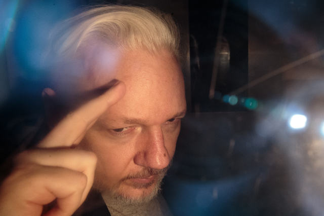 DOJ accuses WikiLeaks founder Julian Assange of recruiting hackers